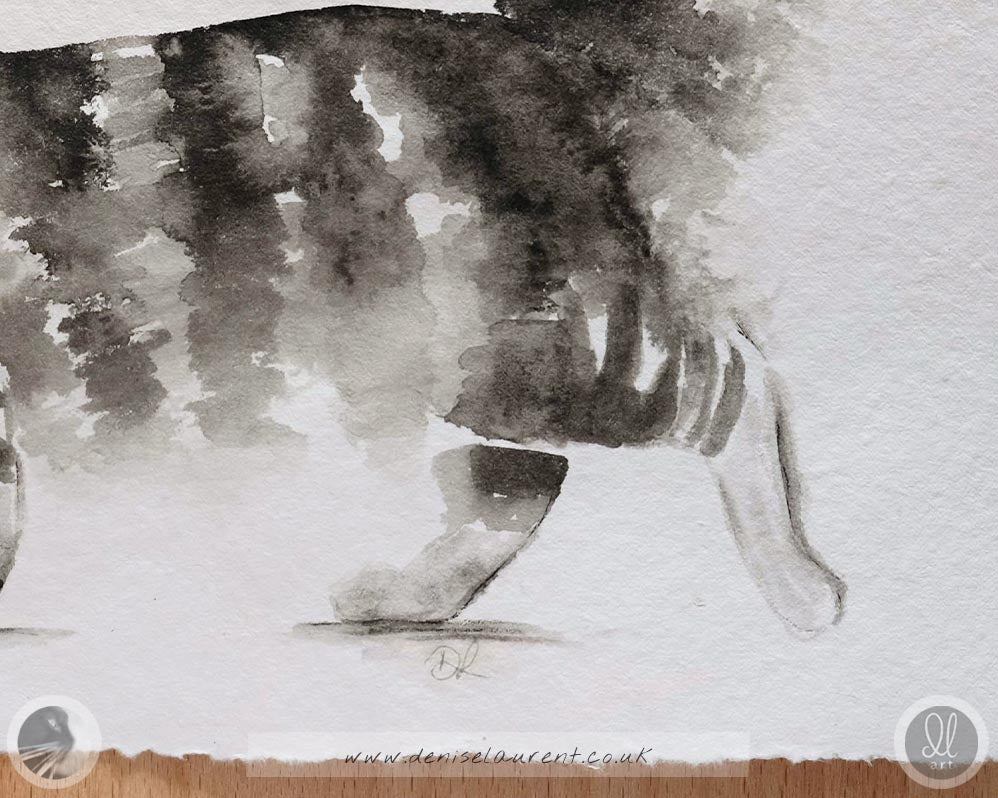 Close up detail of this watercolour painting showing paws of the tabby cat and the texture of the handmade paper.