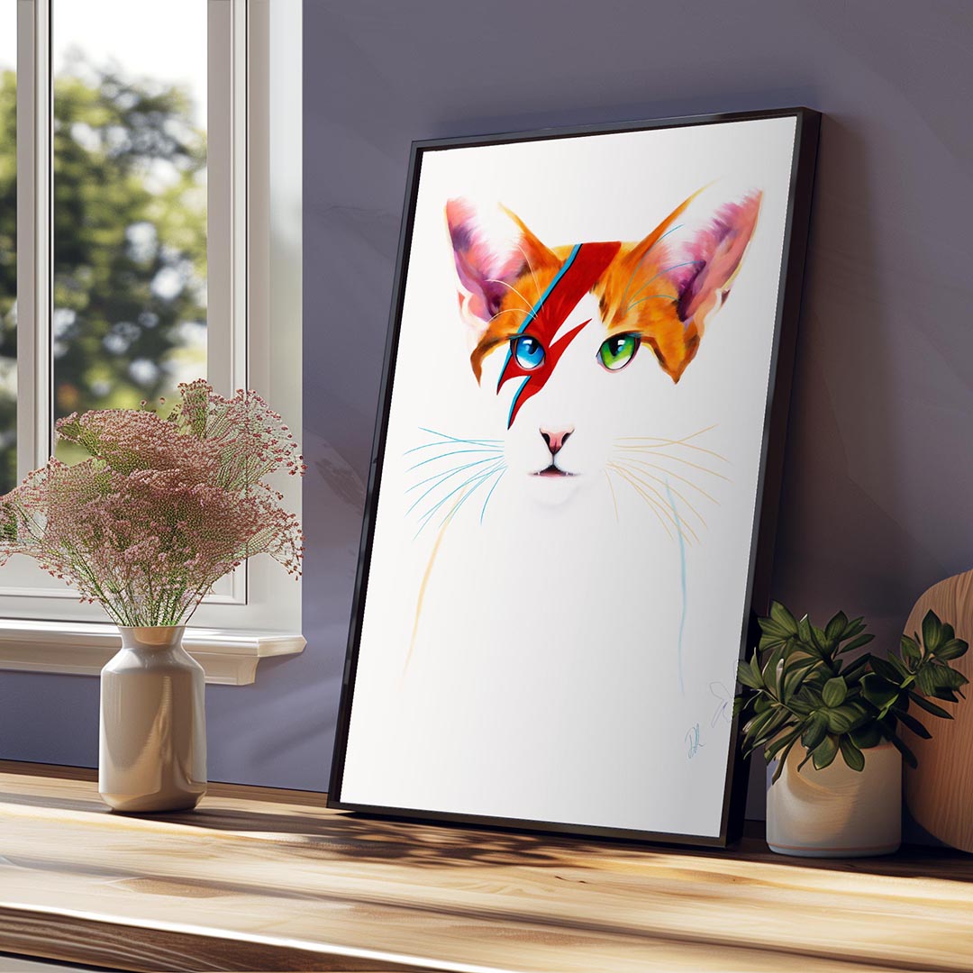 David Meowie - Framed Canvas Print displayed in a stylish room, showcasing a cool white and ginger cat with striking eyes, one green one blue, a tribute to David Bowie.