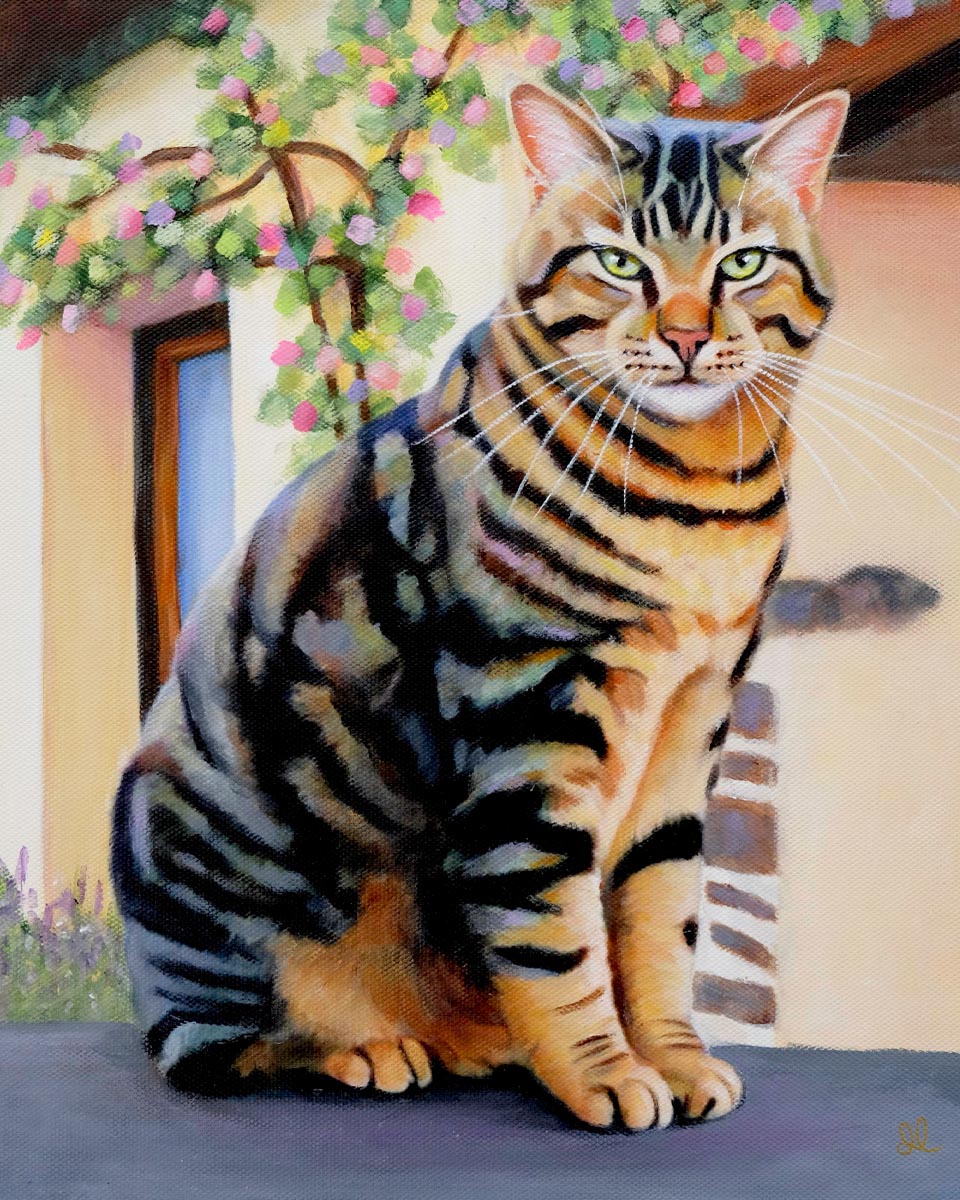 Painting of a tabby cat sitting on a wall with roses growing up the house behind him.