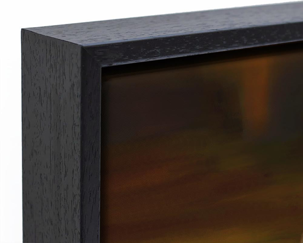 Close-up of the wood frame of the framed canvas.