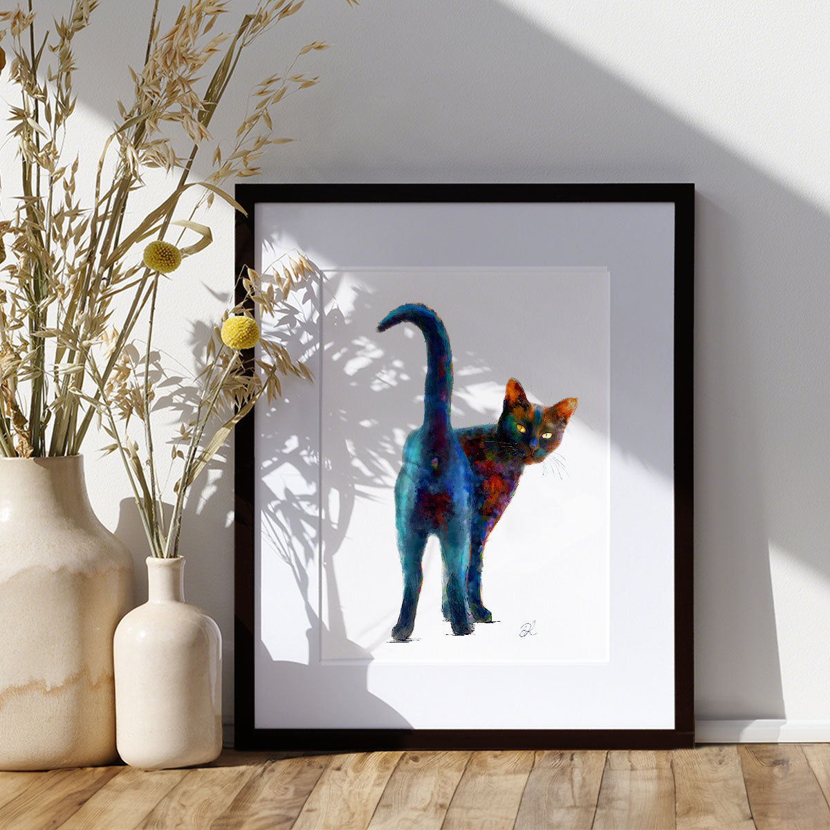 Black and Proud a striking semi-abstract print of a black cat.  He's looking back over his shoulder at us on a white background. This is an art print on paper.