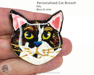 Custom cat brooch showcasing a charming black and white kitty design, ideal for personalised gifts for cat enthusiasts.