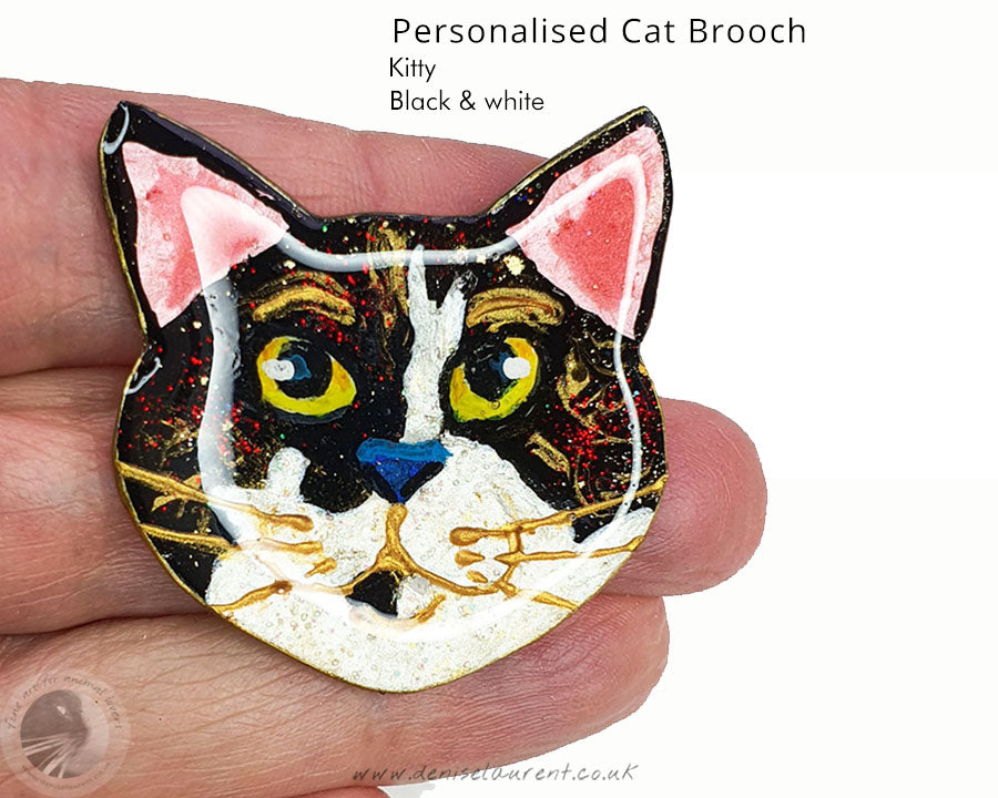 Custom cat brooch showcasing a charming black and white kitty design, ideal for personalised gifts for cat enthusiasts.