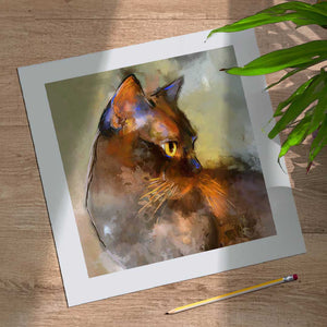 A brown cat limited edition print on paper. The cat is brown with yellow eyes on a green background. She's printed on fine art paper, signed, titled and numbered by hand on the front and the back of the print.