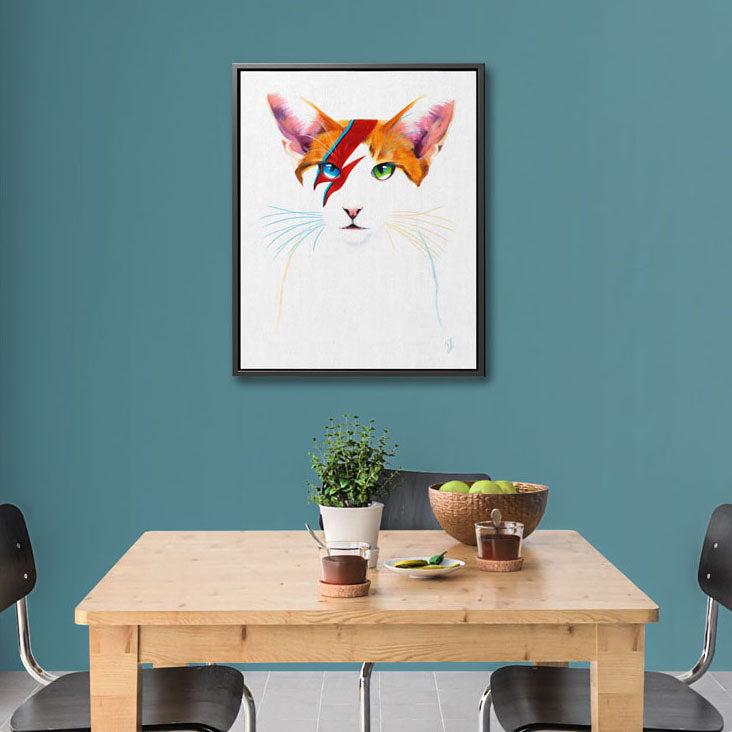 David Meowie - Framed Canvas Print hanging in a modern kitchen, adding a fun and an artistic vibe with a cool white and ginger cat design inspired by Aladdin Sane.