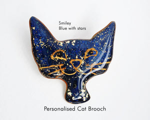 Custom cat brooch presenting a blue cat with stars, a creative and unique piece for cat lovers.