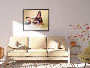 Brown cat framed canvas print hung in modern interior, featuring a Tonkinese cat lounging on the stairs, enhancing the living space.