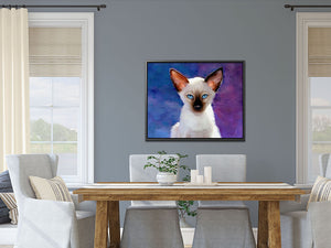 Siamese cat framed canvas hanging in a modern dining room. Siamese cat home decor.
