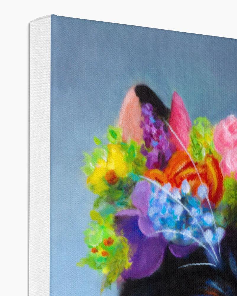 a pretty calico cat wearing a flower tiara