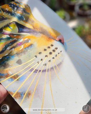 gold whiskers catching the light on a tabby cat watercolor painting
