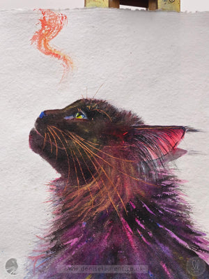 detailed close up of a black cat watercolour painting showing her face with copper whiskers and the red flash she is looking at and the edge of the handmade paper.
