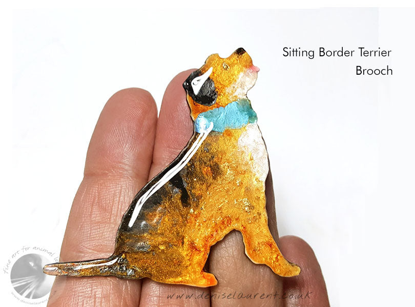 cute border terrier dog brooch.