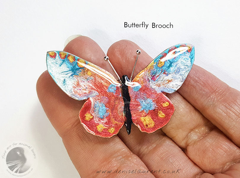 a pretty butterfly brooch in pinks, blues and white - one-of-a-kind