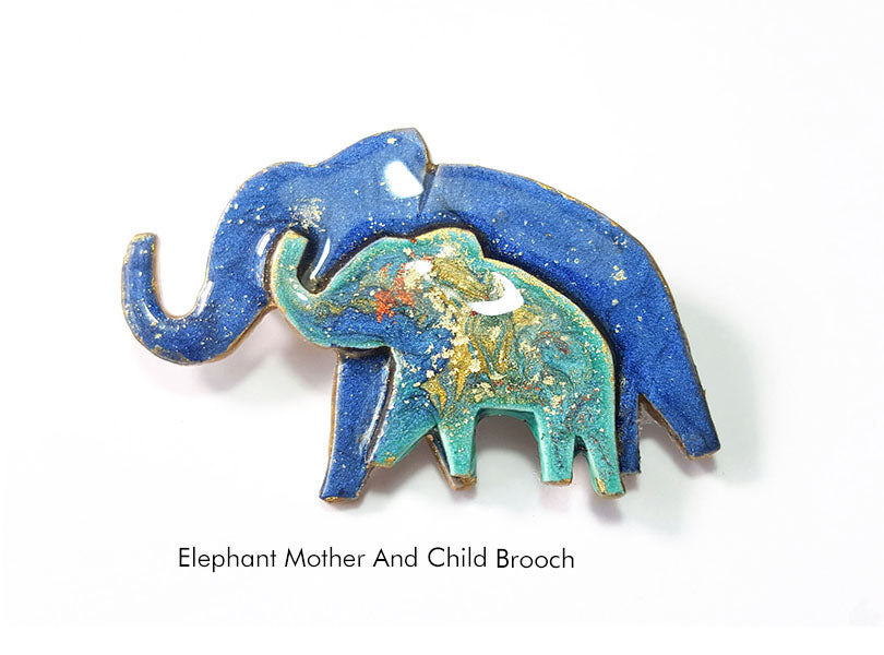 unique mother and baby elephant brooch in blues and turquoise 