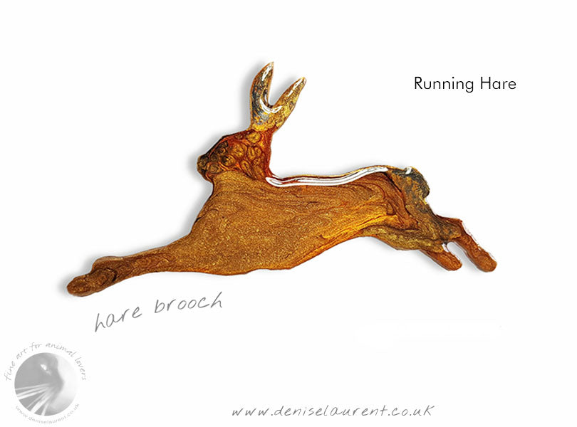 a running hare brooch