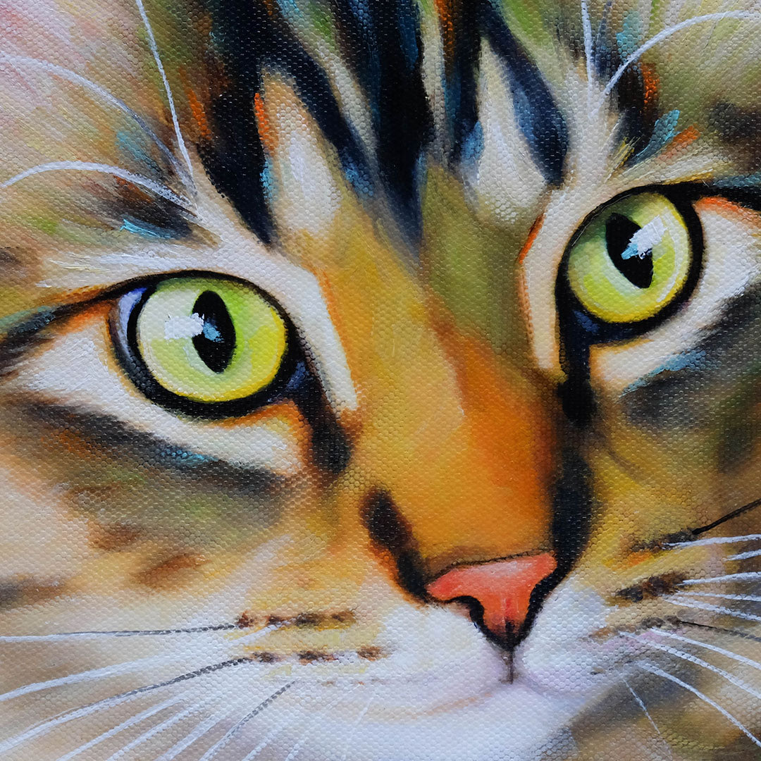 Close-up of a cat's face with detailed fur and green eyes