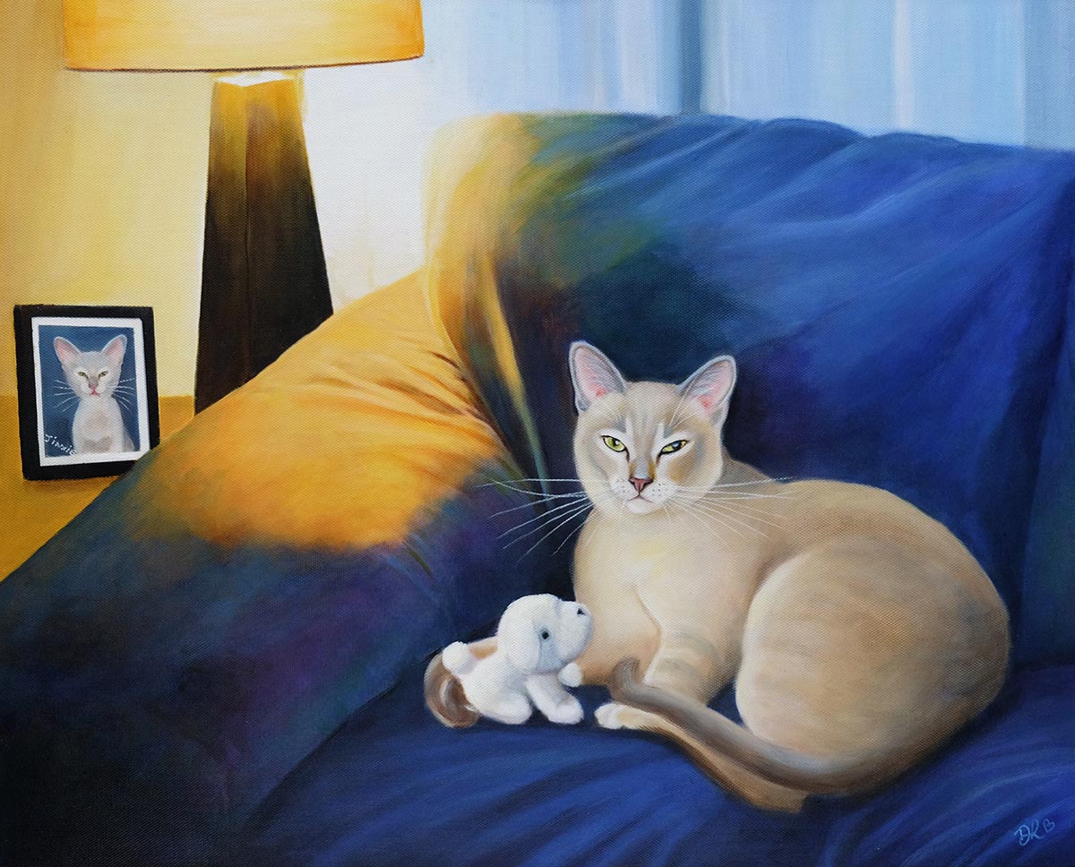 commissioned painting of a burmese cat curled up on the sofa with his favourite toy