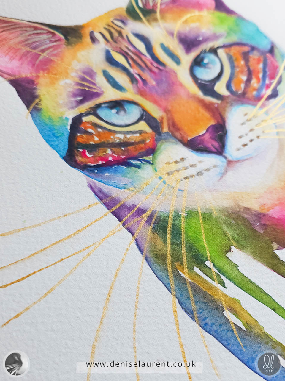 Colorful cat painting in watercolour with pinks, yellows, blues and greens on a white background