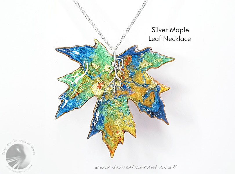 a handmade silver maple leaf necklace. Its double sided so you get two different looks in one pendant.