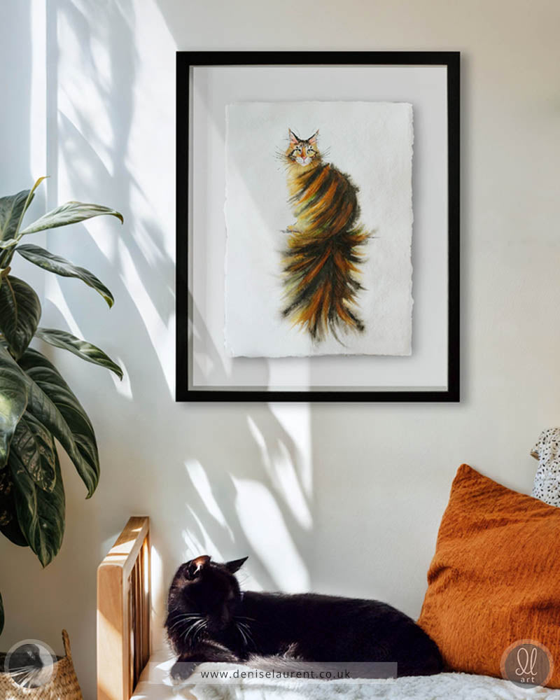 A tortie long haired cat painted in watercolour on handmade paper with 4 deckle edges.