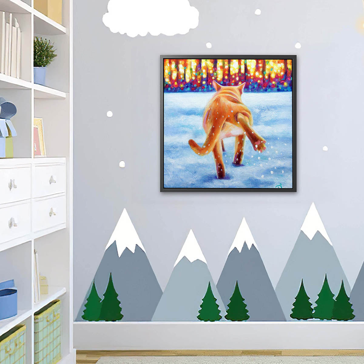 Framed artwork of a cat in the snow in a children's room