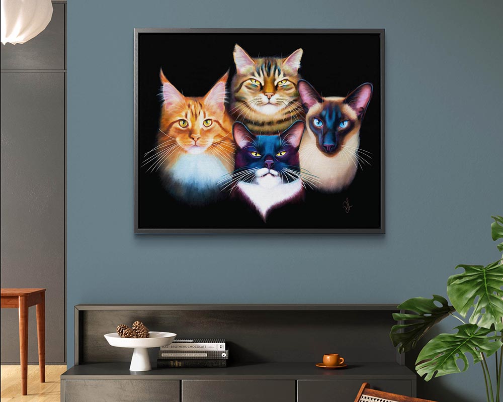 Bohemian Catsody framed canvas print featuring four colourful cats: a tabby, Maine Coon, a Siamese, and a tuxedo cat, against a black background.