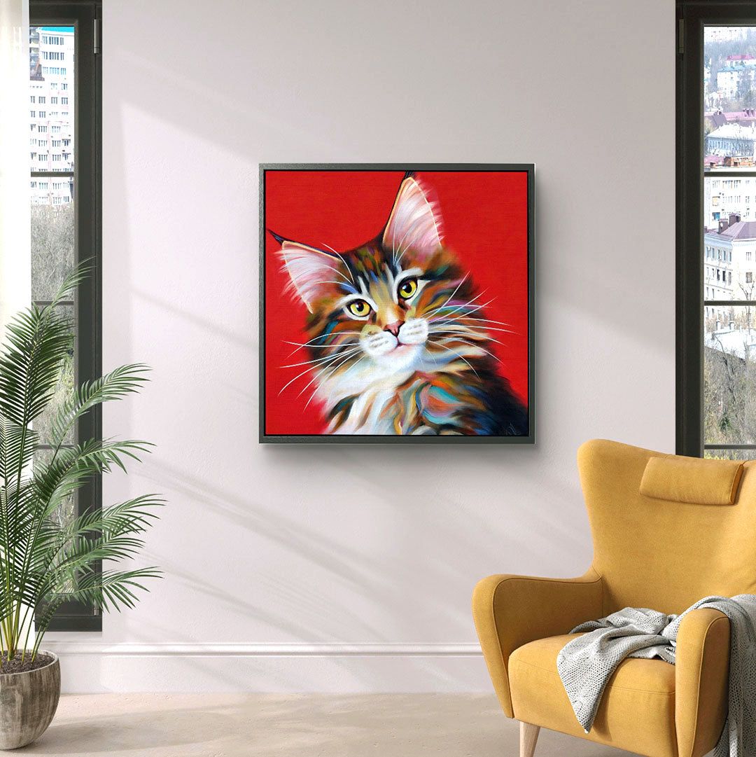 Framed artwork of a tabby Maine Coon cat with striking colours on a red background, ideal for enhancing any space with Maine Coon cat wall art.