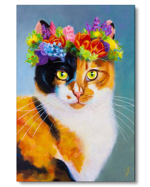 a pretty calico cat wearing a flower tiara