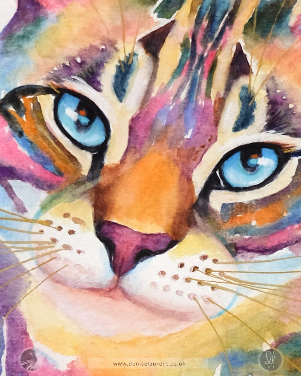 Colorful watercolor painting of a cat's face on a white background