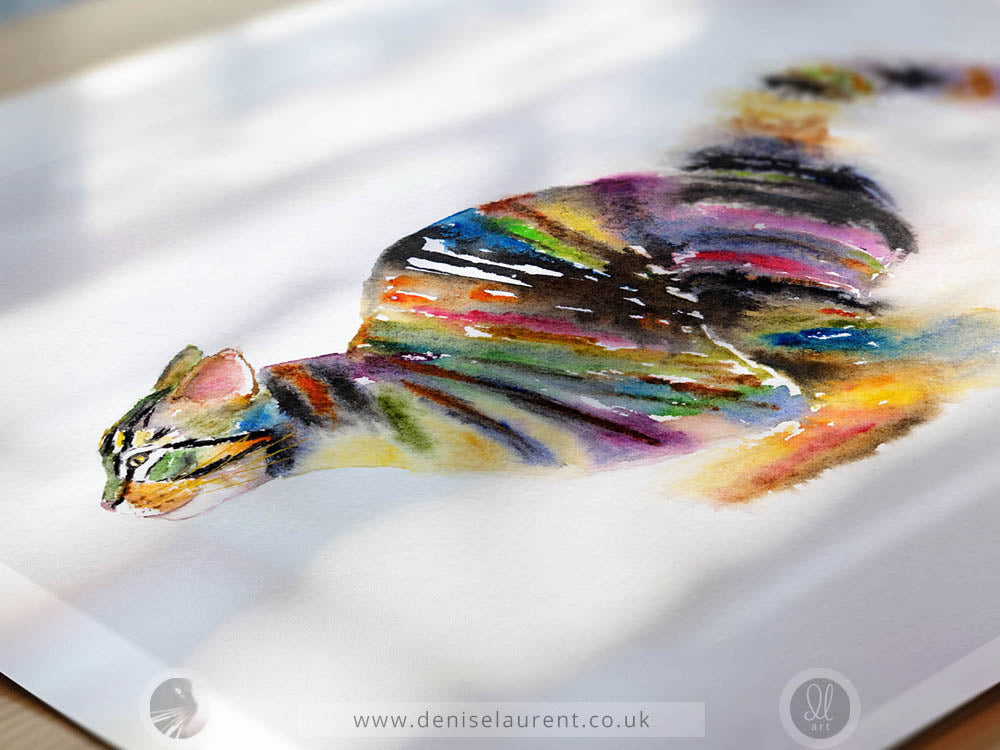 Art print from a watercolor painting of a tabby cat in motion, rendered with vibrant multicolored brushstrokes on a textured white paper background. 