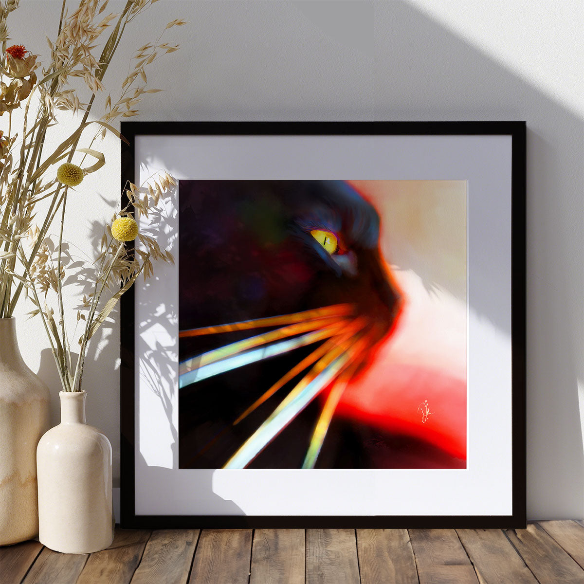 contemporary abstract art print of a black cat face and whiskers on a red backgound