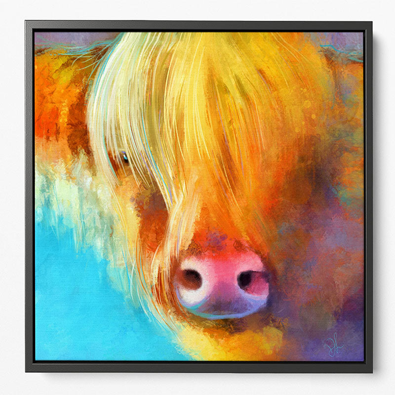 Highland cow wall art featuring a blonde coo with a long fringe, in warm summer colours and framed in a wood floater frame.