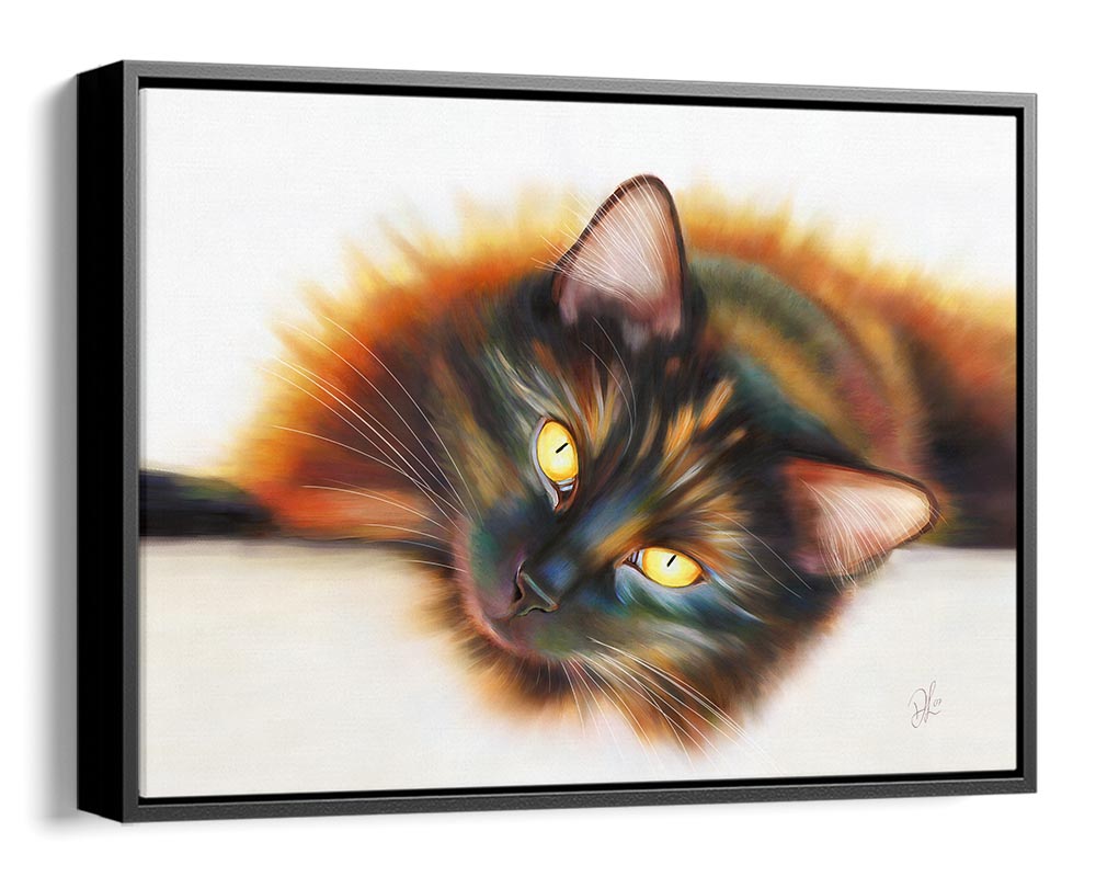 'Sunbathing' framed canvas, a beautiful tortoiseshell cat artwork featuring a long-haired cat with yellow eyes and a rich, multi-coloured coat, lying in the sun. The sun gives her a golden halo in her fur. 